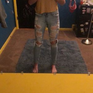 Light blue ripped jeans